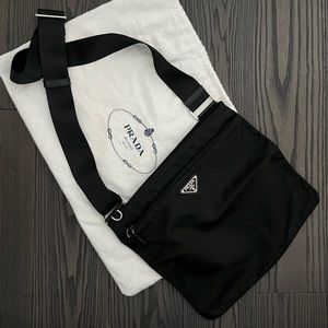 Prada Tessuto crossbody bag. Unisex. Gently used. Almost new. Authentic. $628